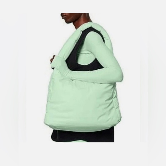 RAINS Mint Green Quilted Shoulder Bag with Crescent Shape and Wide Strap - Picture 1 of 12